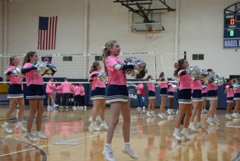 Nagel cheerleaders lead a cheer during the pink out pep rally
